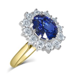 Oval Sapphire and diamond cluster ring
