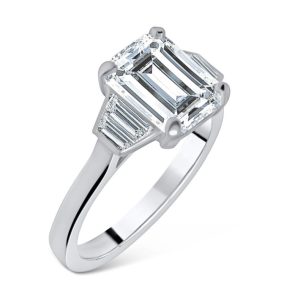 Three stone emerald cut with trapezoid cut diamond ring 3.09ct