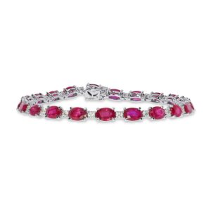 Oval cut ruby and round brilliant cut diamond line bracelet