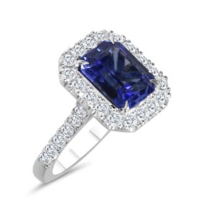 Octagonal sapphire and diamond cluster ring with diamond shoulders