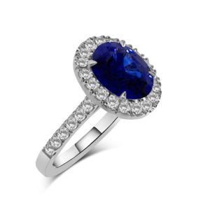 Oval sapphire and diamond cluster ring