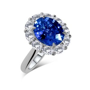 Sapphire and oval diamond cluster ring