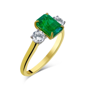 Emerald and diamond three stone ring
