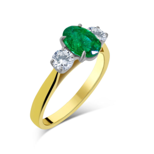 Emerald and diamond three stone ring