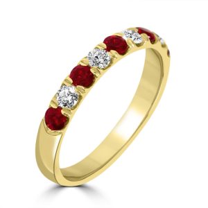Round cut ruby and diamond half eternity ring