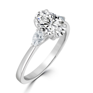 Oval with pear shaped diamond ring